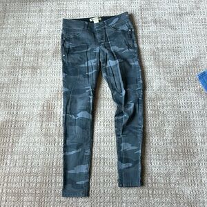 Jean pants with camouflage design.